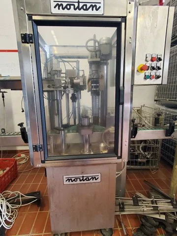 Nortan capsuling machine