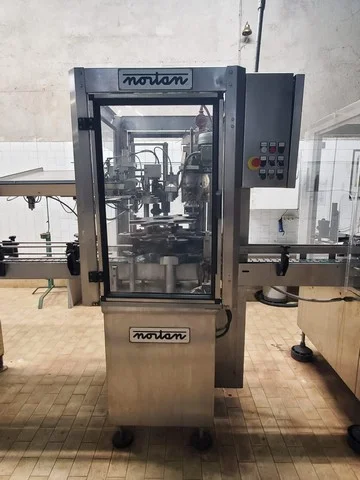 Nortan capsuling machine