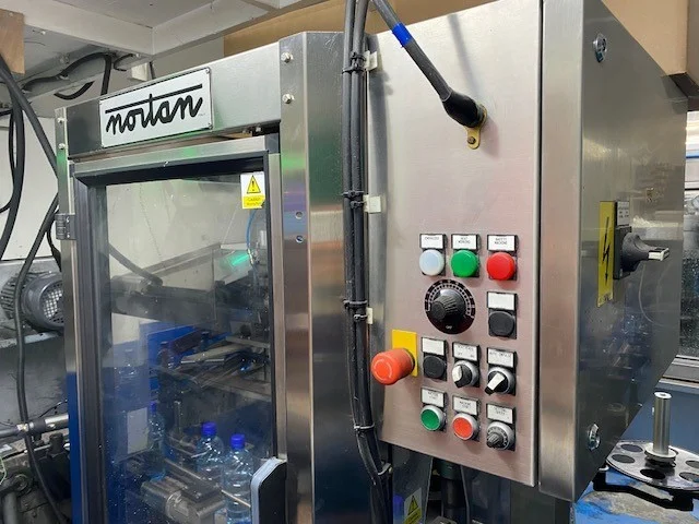 Nortan capsuling machine