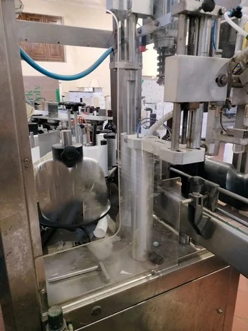Used OMB capsuling machine with labeller photo 2