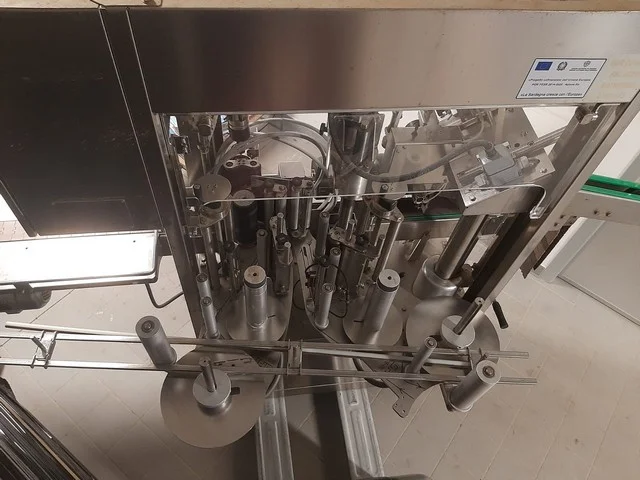 Used Gai capsuling machine with labeller photo 9