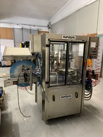Nortan capsuling machine