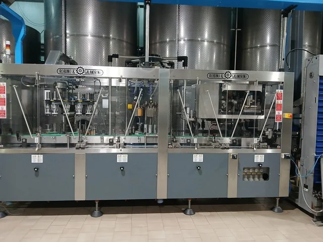 Robino & Galandrino capsuling machine for PVC and polylaminate