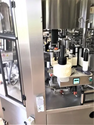 Used labeller Newtec adhesive 3.500 bph photo 3