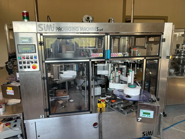 SMI adhesive labeller — EA 704