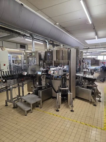 Sacmi 12T 6S self-adhesive labeling machine