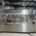 Ape hot melt Nordson bottom closure carton erector — photo 1