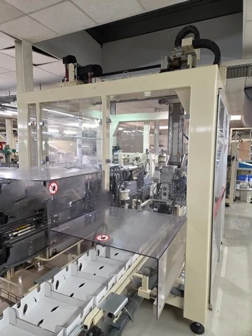 Cermex case packer with divider