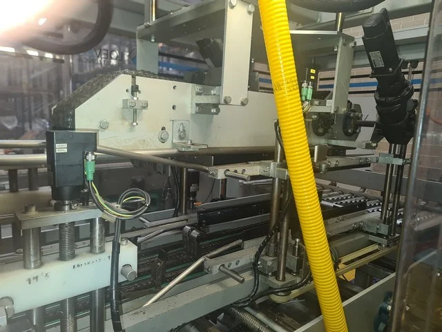Used hot melt wrap Around Loeven photo 10