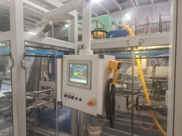 Used hot melt wrap Around Loeven photo 2