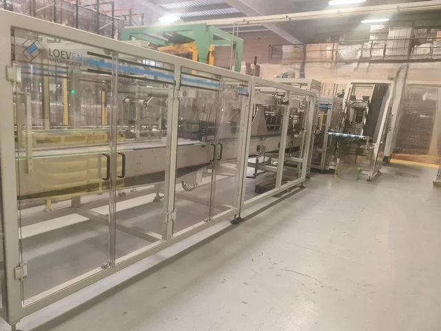 Used hot melt wrap Around Loeven photo 7