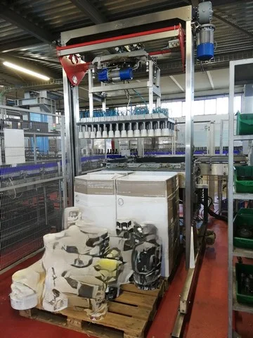 Ape uncaser and depalletizer