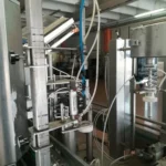 Monoblocco di riempimento Polaris usato con etichettatrice — foto 16