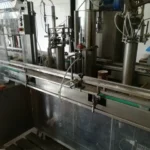 Monoblocco di riempimento Polaris usato con etichettatrice — foto 19