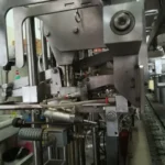Monoblocco di riempimento Polaris usato con etichettatrice — foto 8