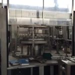 Monoblocco di riempimento usato Krones vacufill PET 32.32.8 — foto 2
