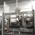 Monoblocco di riempimento usato Krones vacufill PET 32.32.8 — foto 3