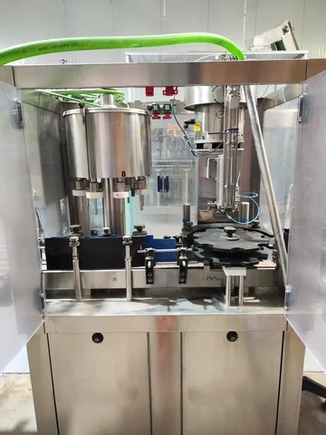 Monoblocco di riempimento IDROTECNICA 8.1 usato per tappi a corona Ø26 mm e Ø29 mm
