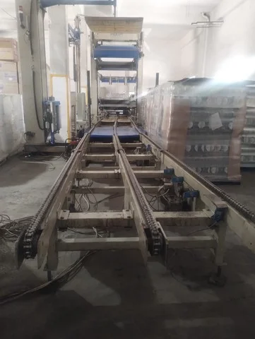 Sacmi palletizer with semi-automatic pallet wrapper